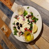 Shepard's Salad · Fresh tomatoes, cucumbers, green peppers, feta cheese. Parsley and onion mixed with lemon an...