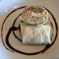 Thai Wrap · Rice with chicken or tofu, tomatoes, onions, crunched peanuts, curry powder and peanut sauce...
