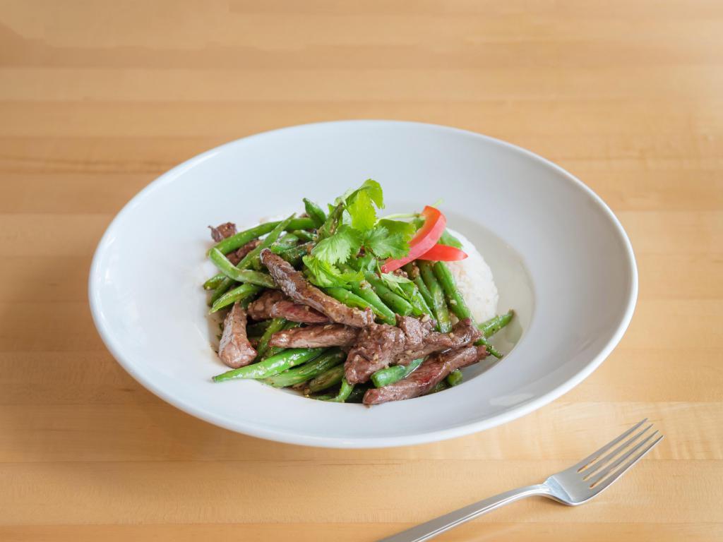 Ribeye Steak with Green Beans · A smooth, fine texture and exceptional tenderness. USDA grade ribeye steak, green bean, red bell peppers stir-fried with chef's special sauce and a rich of black pepper.