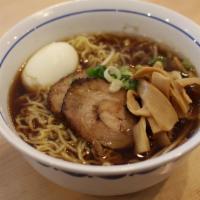 Shoyu Ramen · delicious broth with chashu, menma, sprouts, scallions and egg.
