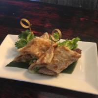 Duck Roll · Soft crispy roll with cucumber, scallion and chef's special sauce.