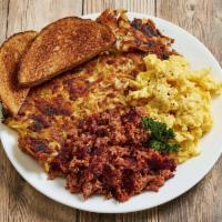 Corned Beef Hash and Eggs · Homemade corned beef hash served with 2 eggs any style.