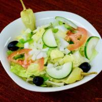Fresh House Salad · Fresh lettuce, tomatoes, red onions, cucumbers and green peppers, and pepperoncini with choi...