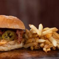 Habanero Jack Burger · Pepper jack, smoked bacon, jalapenos, caramelized onions and habanero aioli. Served with cho...