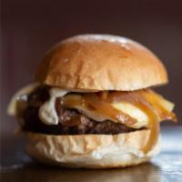 French Onion Burger · Brie, caramelized onions and roasted garlic aioli. Served with choice of french fries or swe...