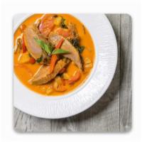 Roasted Duck in Red Curry · Tomato, pineapple, peppers and basil. Served with jasmine rice.