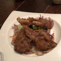 Lamb Chops · (4) grass fed lab chops tossed in savory teriyaki infused with red wine and topped with fres...
