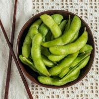 Edamame · Blanched soy beans served with Japanese sea salt.