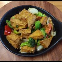 V8. Home Style Sauteed Fried Tofu ** · W/ assorted veggies 家常豆腐
