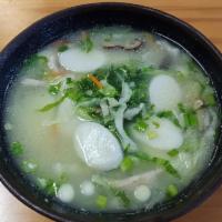 N12. Rice Cake Soup with Preserved Vegetable · w/ Pork. 雪菜湯年糕