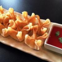 8 Crab Rangoon · Imitation crabmeat blended with cream cheese and yellow onion wrapped in thin wonton skin se...