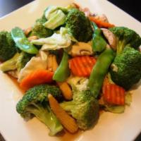 Pad Vegetables · Broccoli, snow pea, baby corn, mushroom, carrot and cabbage stir-fried with soy bean sauce. ...