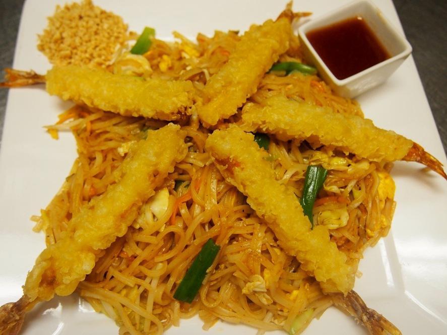 King Pad Thai · Bistro 38 brings the taste of Japan on a plate with (4 pcs)crispy shrimp tempura blended with our well-known stir-fried pad Thai noodle. Served with sweet and sour sauce.