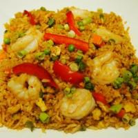 Tom Yum Fried Rice · Red bell pepper, egg, yellow onions, green onions, peas and carrots in special made tom yum ...