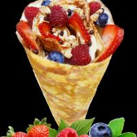 6. Wild Berries Crepe · Sliced strawberries, blueberries, raspberries, custard cream, whipped yogurt, chocolate pear...