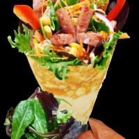 20. Okinawa Hot Dog Crepe · Okinawa hot dog, mesclun mix, julienned carrots, cheddar cheese, red onions, red peppers, co...