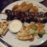 Lamb Kebab · Served with assorted peppers and onions.