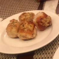 4 Piece Garlic Knot · Served with tomato sauce.