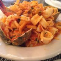 Linguine di Mare · Baby clams, shrimp, calamari, touch of crushed red pepper, in a light marinara sauce.