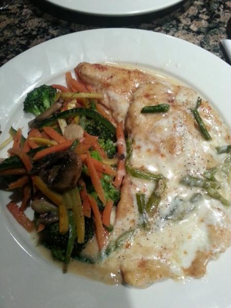 Pollo Monte Carlo · Chicken breast sauteed with shallots, asparagus and melted mozzarella in a champagne sauce.