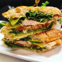 Pesto Chicken Sandwich · Grilled Chicken breast, tomato, red onion, spinach, mozzarella, Pesto Aioli served on Brioch...