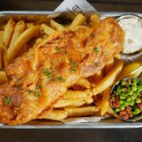 Fish & Chips · Beer battered fish fillet served with Tartar sauce, lemon & spicy bacon green peas          ...