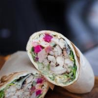 Chicken Shawarma Wrap · Mix Greens, Hummus, Persian Cucumbers, Tomatoes, Pickled Turnips, Tahini, Garlic Sauce