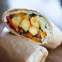 Chinese Chicken Wrap · White meat. Wrapped with romaine lettuce, scallions, wonton strips, carrots, red cabbage, ma...