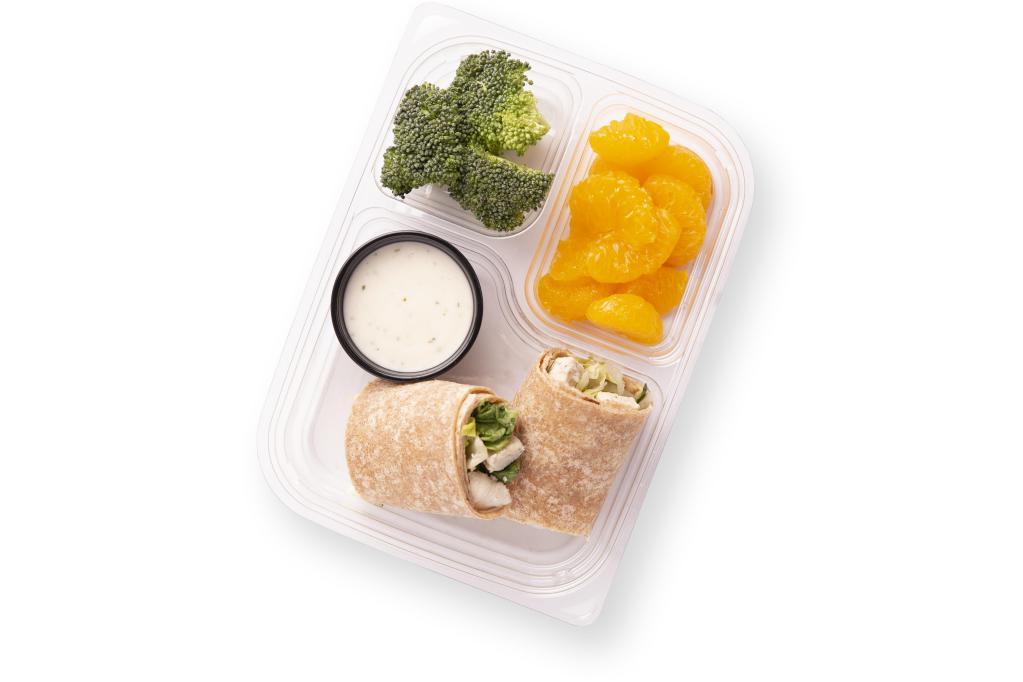 Kids Grilled Chicken Caesar Wrap · This timeless classic featuring Grilled Chicken in a half-wrap size is a favorite among kids. It is served with a choice of 1 Veggie and 1 Fruit, and a Dip or Dressing is served on the side.  All Kids Works menu items are served with a Juice Box.