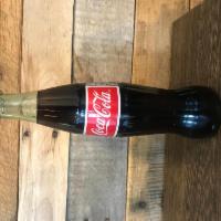 Mexicola · Mexican coke made with cane sugar.
