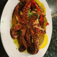Grilled Baby Octopus in Garlic, Roasted Peppers & Onions · Polvinho Grelhado em Pimentos, Alho e Cebola.