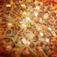 Casablanca Pizza · Parmesan cheese, roasted garlic sauce, mozzarella, artichoke hearts, button mushrooms.