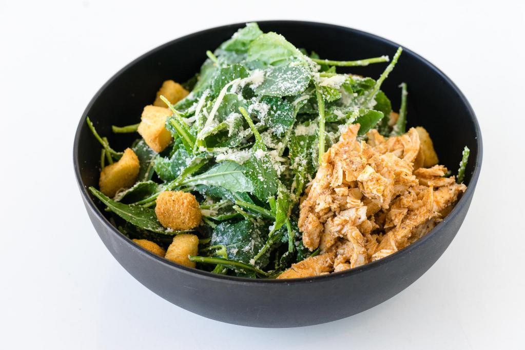 Baby Kale Chicken Caesar Salad · Organic baby kale with Caesar dressing Parmesan cheese, crouton, anchovies with baked marinated chicken breast.