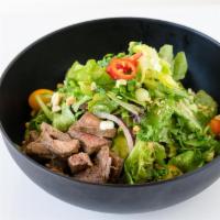 Thai Girl · Butter lettuce, spring mix, chilly cilantro dressing, cherry tomato, red onions, cucumber, c...