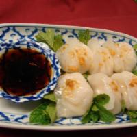 Shrimp Dumpling · Dumplings stuffed with shrimp and bamboo shoots. Topped with fried garlic, served with fried...