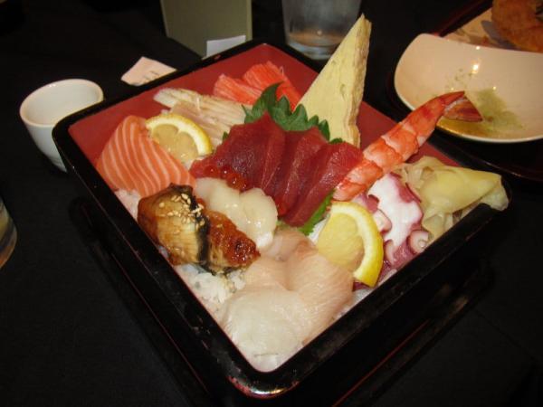 Chirashi Bowl · A traditional sushi dish in Japan. Assorted chef's choice sashimi over sushi rice. Served with miso soup.