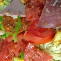 Chef Salad · Lettuce, pepperoni, ham, salami, bacon, mozzarella and cheddar cheese, tomatoes, green peppe...