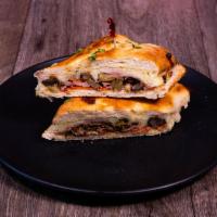 Muffaletta Sandwich · Pepperoni, ham, salami, olive salad and cheese.