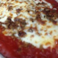 Classic Lasagna · Pasta sheets layered with ricotta cheese and meat sauce and topped with melted mozzarella ch...