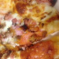 Meat Lovers Pizza · Pizza sauce, cheese, ham, pepperoni, beef and Italian sausage.