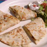 Quesadilla · Corn or flour tortillas filled with smooth, melted Monterrey jack cheese. 