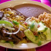 Tilo's Supreme Plate · Two cheese enchiladas and a hearty portion of chicken or beef fajita. Served with rice, refr...