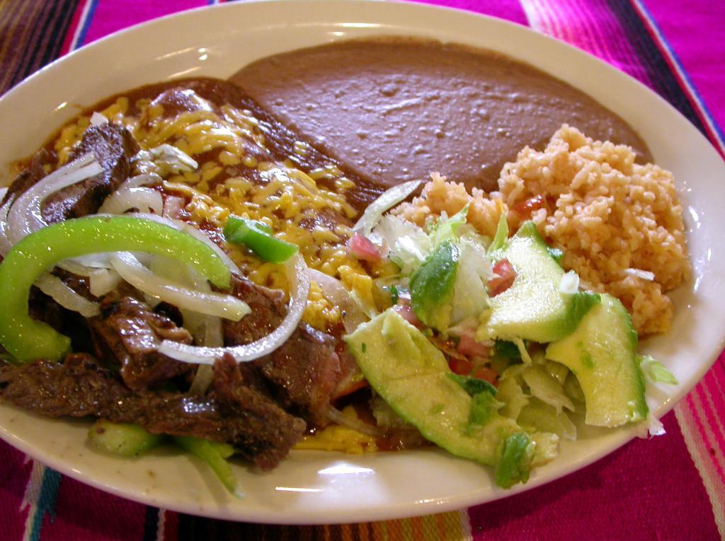 Tilo's Supreme Plate · Two cheese enchiladas and a hearty portion of chicken or beef fajita. Served with rice, refried beans and charro beans. 