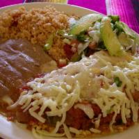 Chile Relleno Dinner · One poblano pepper stuffed with ground beef or panela cheese. Topped with melted cheese and ...