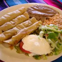 Flautas · Three rolled corn tortillas filled with seasoned shredded chicken or picadillo fried and cri...
