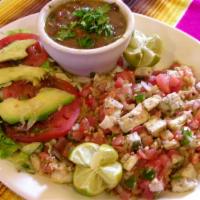 Chicken Fiesta Dinner · Diced chicken fajita grilled with pico de gallo and served on a bed of Spanish rice. Served ...