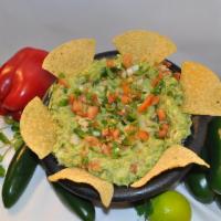 Guacamole · Fresh Guacamole made with Cilantro, onions, Jalapenos and tomatoes. ONLY LARGE GUACAMOLE CAN...