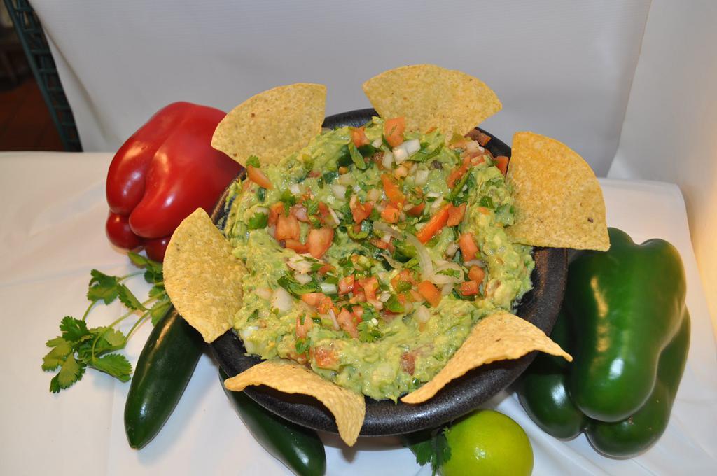 Guacamole · Fresh Guacamole made with Cilantro, onions, Jalapenos and tomatoes. ONLY LARGE GUACAMOLE CAN BE CUSTOMIZED
