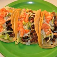 Tacos Supreme · 3 tacos corn or flour tortilla. Choice of chicken, steak, al pastor, carnitas or fish. Serve...