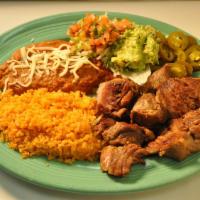 Carnitas Mexicanas · Chunks of delicious tender pork. 100% autentico. Served with rice, beans, lettuce, pico de g...